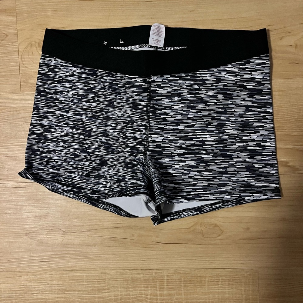 Size large woman’s Stretchy shorts. Fit small.